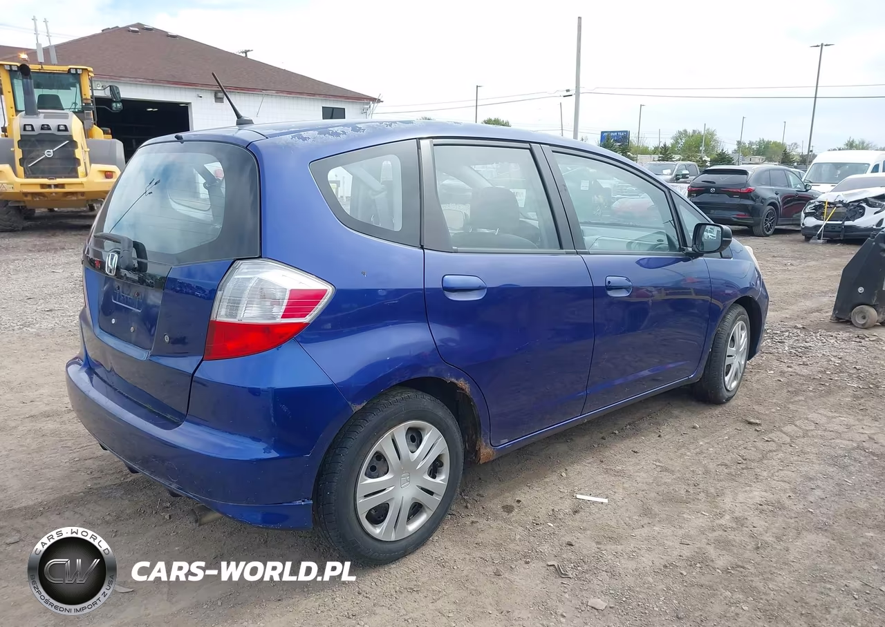 2009 Honda Fit VIN:JHMGE88269S018569 - 4