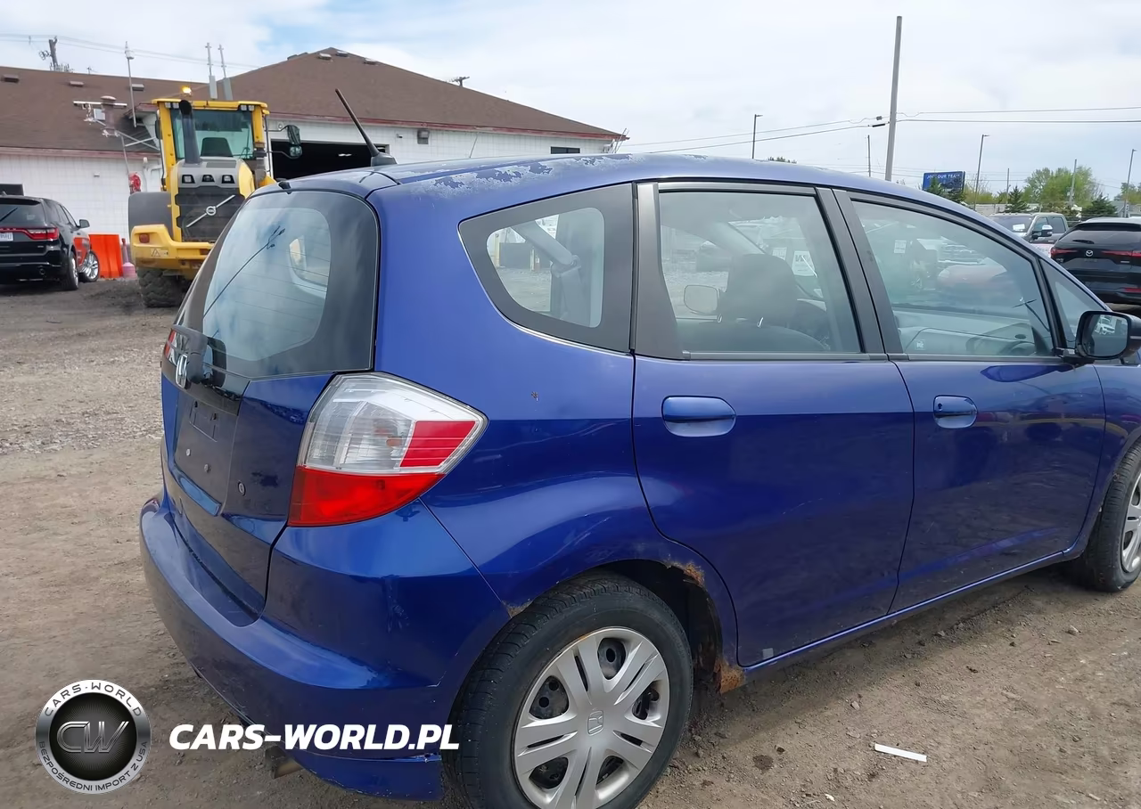 2009 Honda Fit VIN:JHMGE88269S018569 - 6