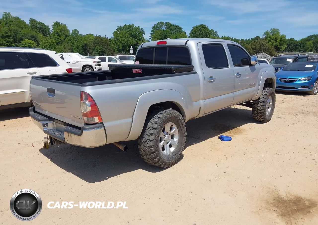 2009 Toyota Tacoma Base V6 VIN:3TMMU52N59M011405 - 4
