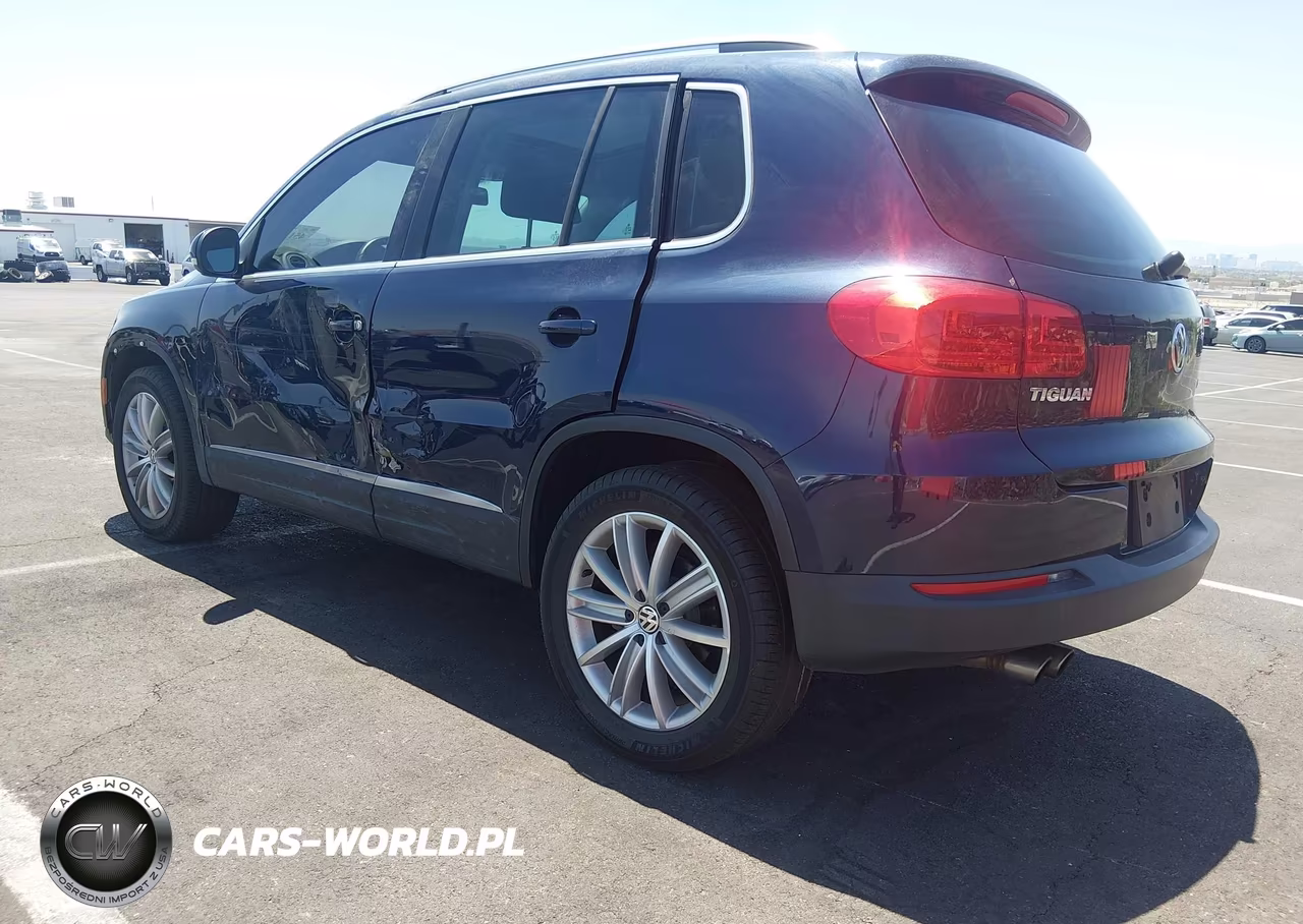 2014 Volkswagen Tiguan Sel VIN:WVGAV3AX7EW559659 - 3