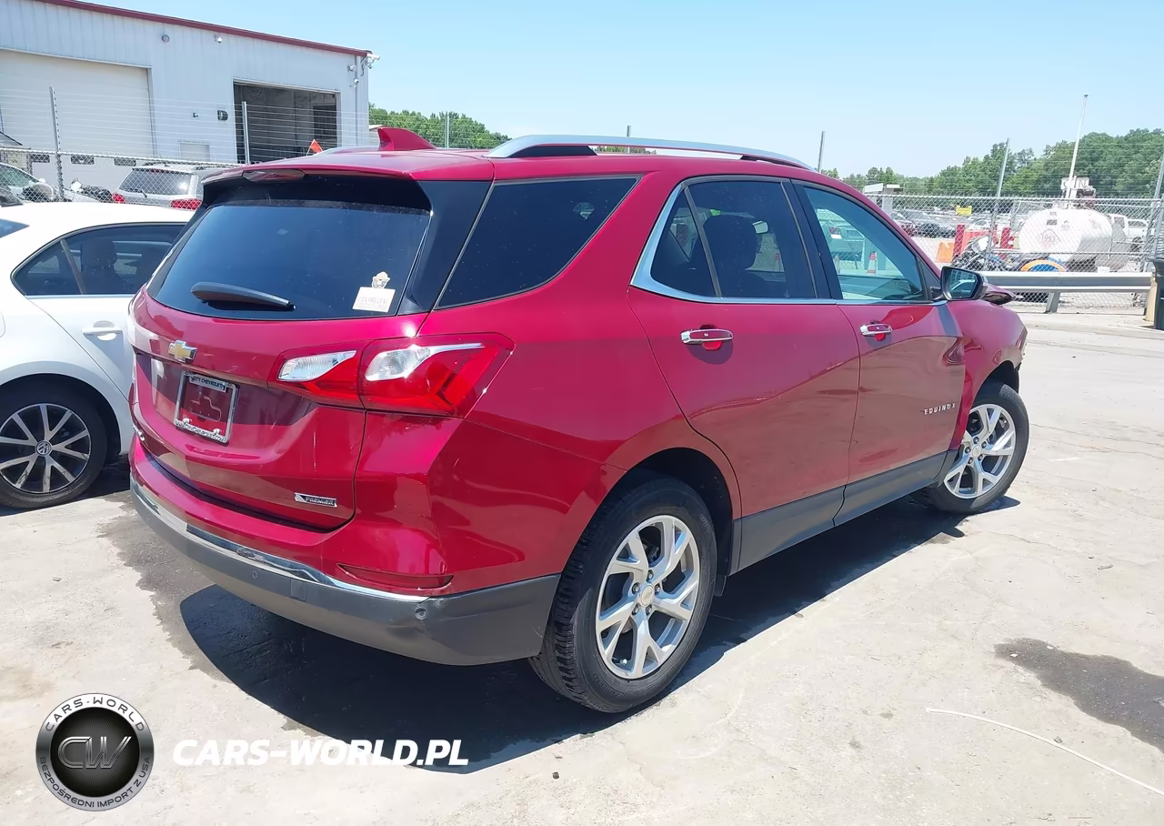 2018 Chevrolet Equinox Premier VIN:3GNAXMEV1JL101975 - 4
