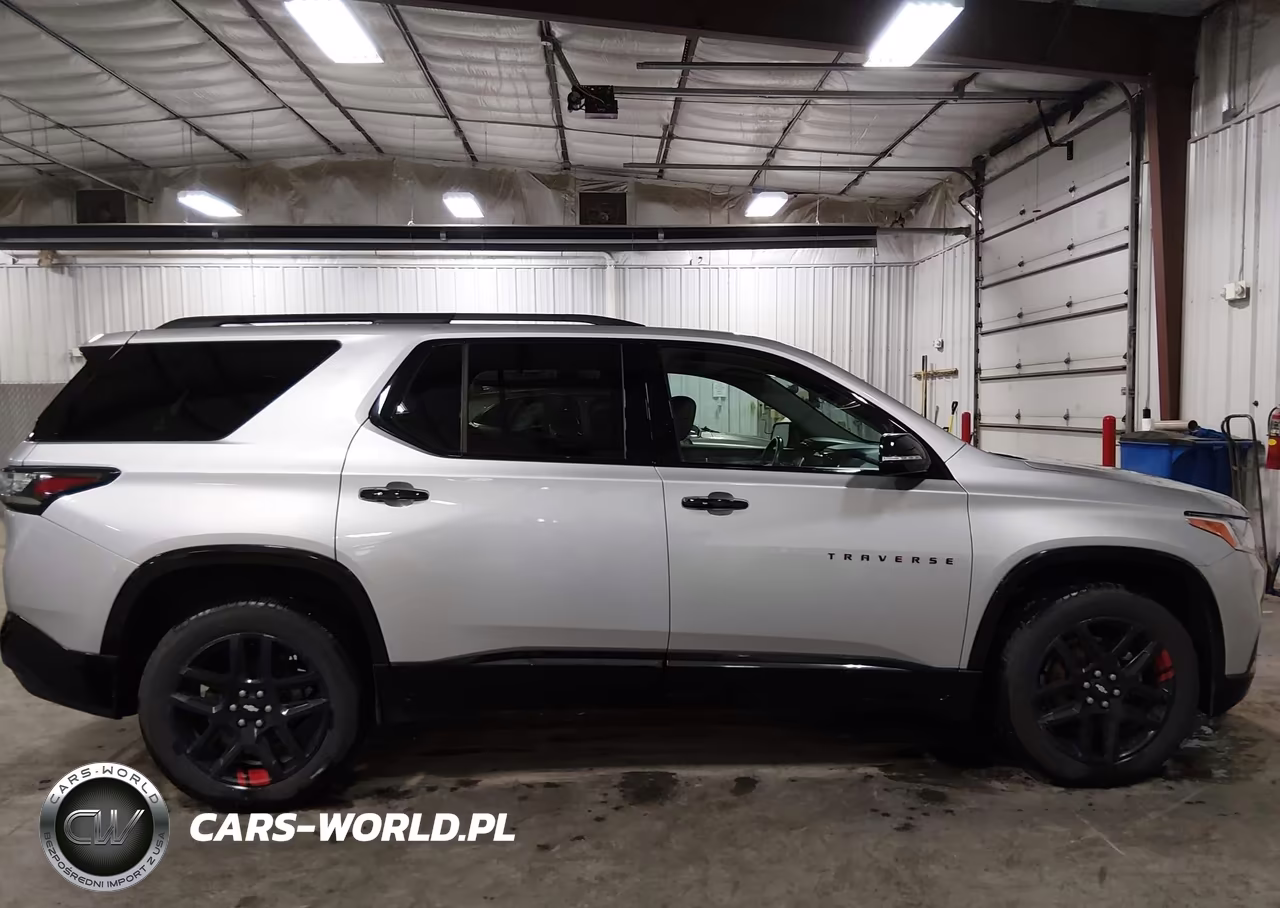 2018 Chevrolet Traverse Premier VIN:1GNEVJKW7JJ118869 - 13