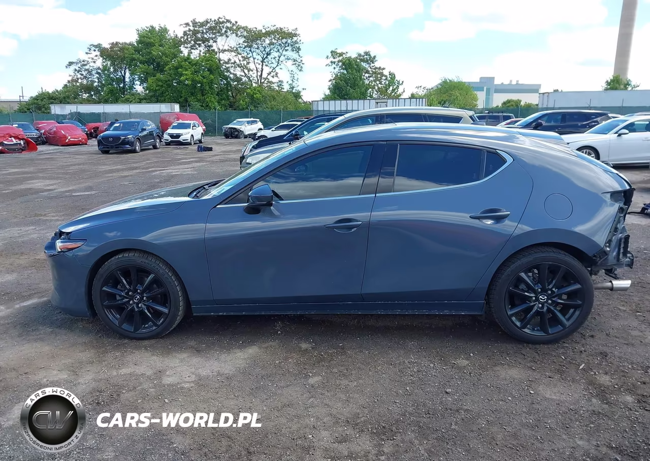 2021 Mazda Mazda3 Premium VIN:JM1BPBML1M1402159 - 14