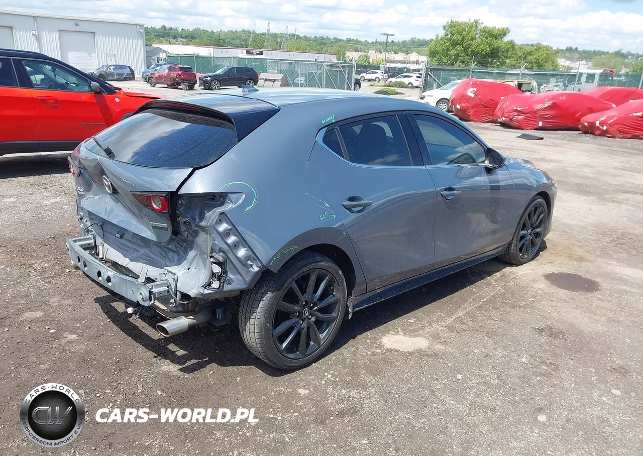 2021 Mazda Mazda3 Premium VIN:JM1BPBML1M1402159 - 4