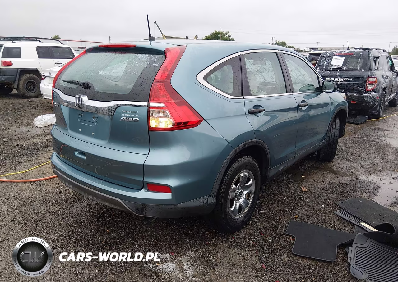 2015 Honda Cr-V Lx VIN:2HKRM4H33FH702679 - 4