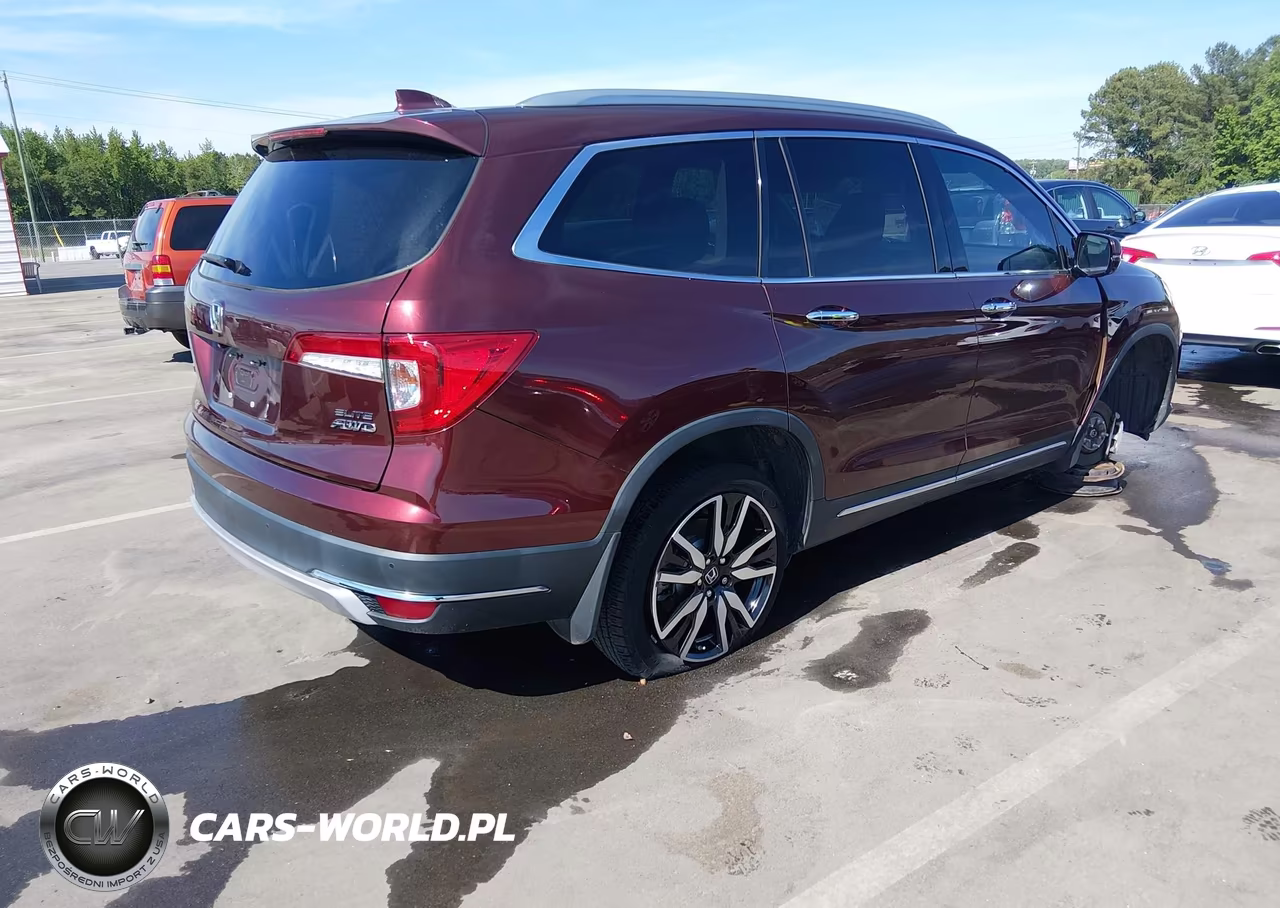 2019 Honda Pilot Elite VIN:5FNYF6H0XKB073907 - 4