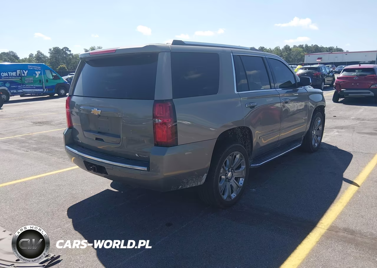 2018 Chevrolet Tahoe Premier VIN:1GNSKCKC2JR155679 - 4