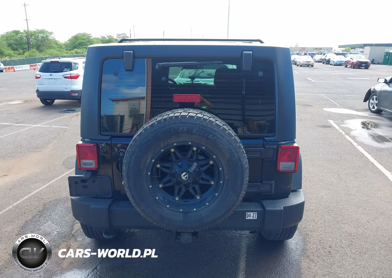 2013 Jeep Wrangler Unlimited Sport VIN:1C4BJWDG7DL504369 - 16