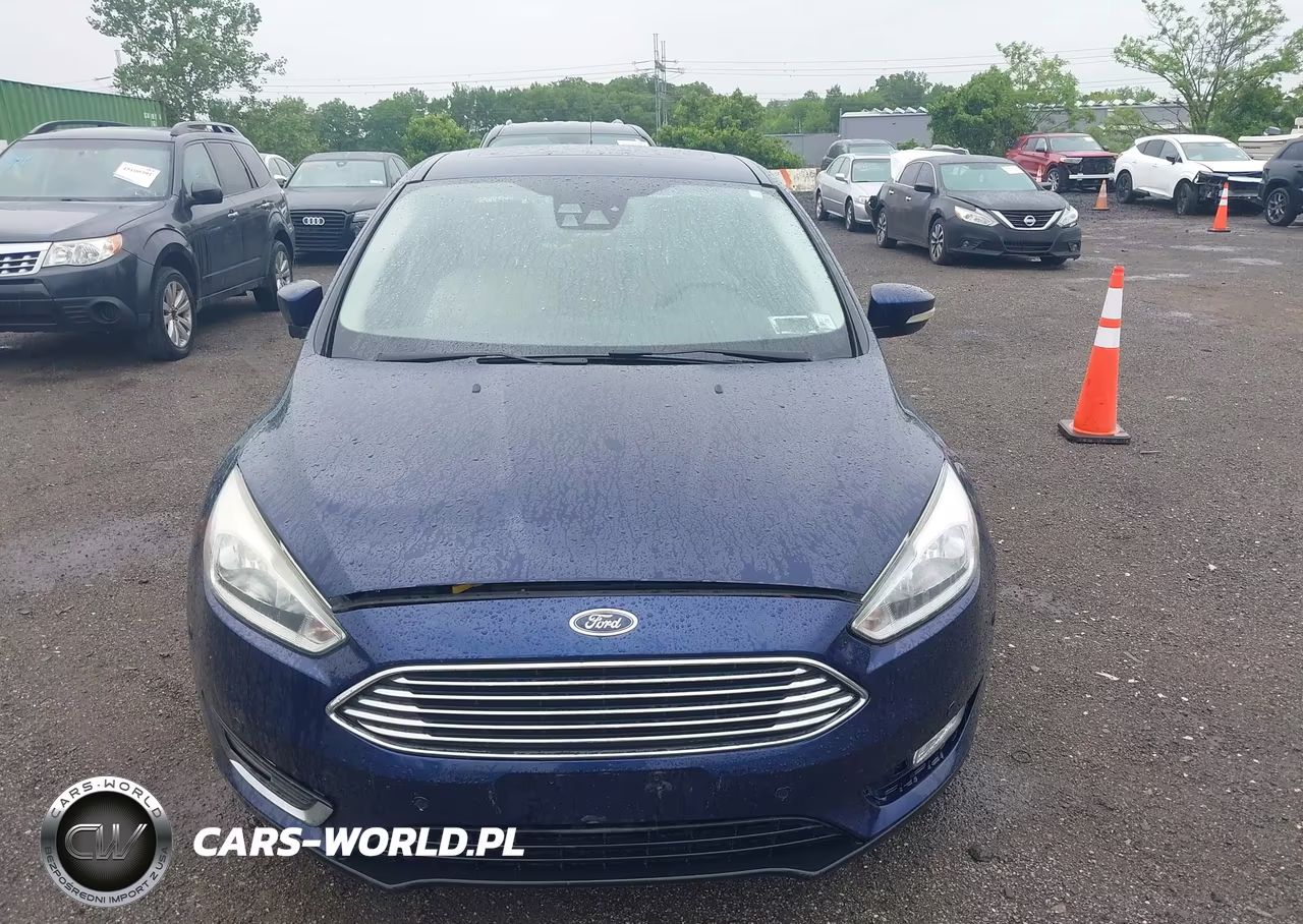 2017 Ford Focus Titanium VIN:1FADP3J20HL202559 - 12
