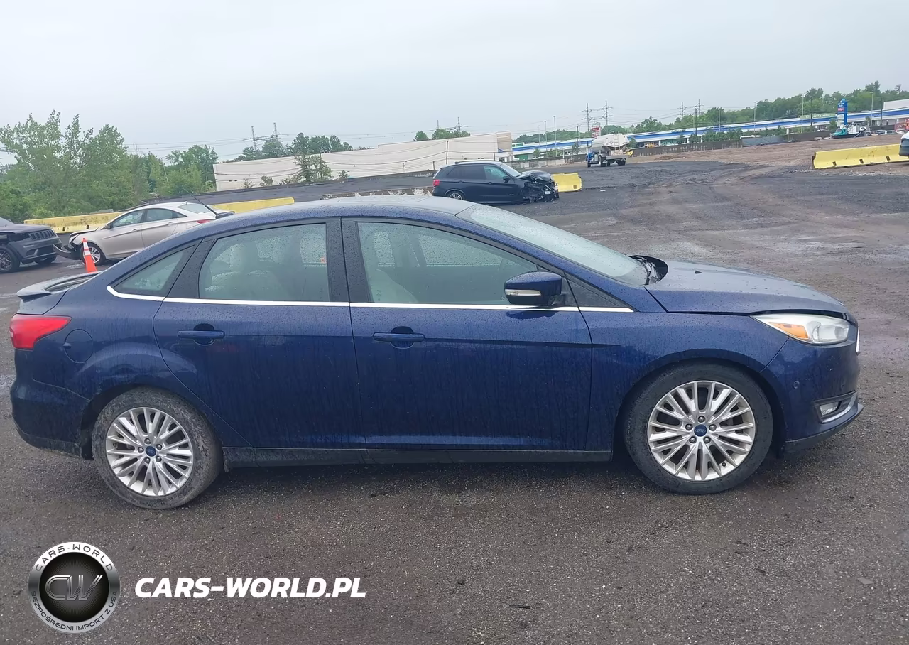 2017 Ford Focus Titanium VIN:1FADP3J20HL202559 - 13