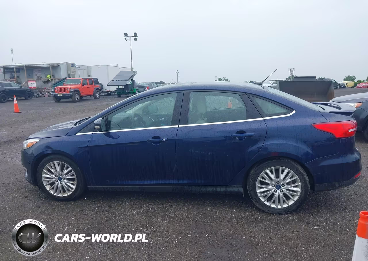 2017 Ford Focus Titanium VIN:1FADP3J20HL202559 - 14