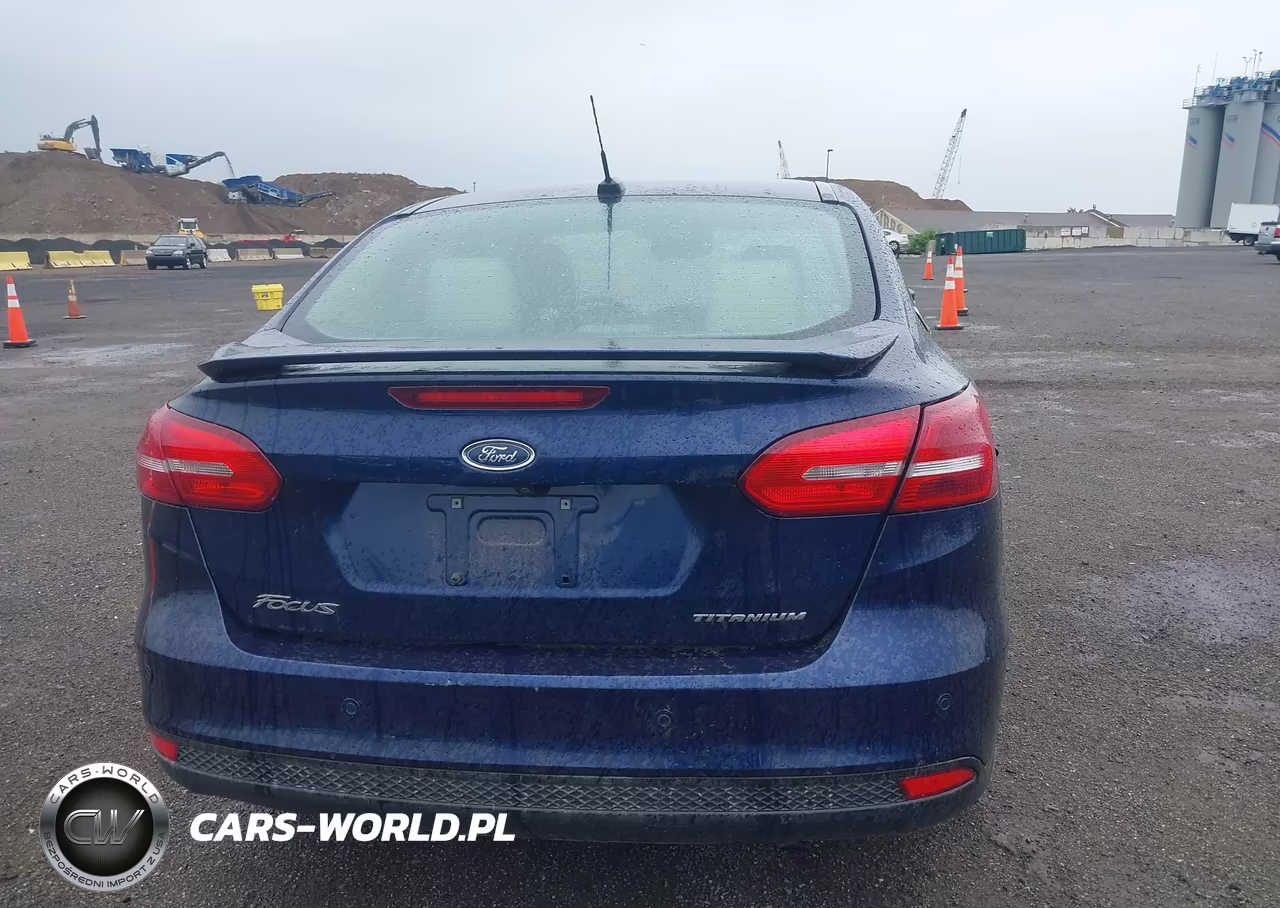 2017 Ford Focus Titanium VIN:1FADP3J20HL202559 - 16