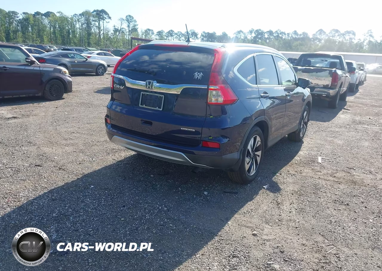 2015 Honda Cr-V Touring VIN:5J6RM3H90FL021285 - 4