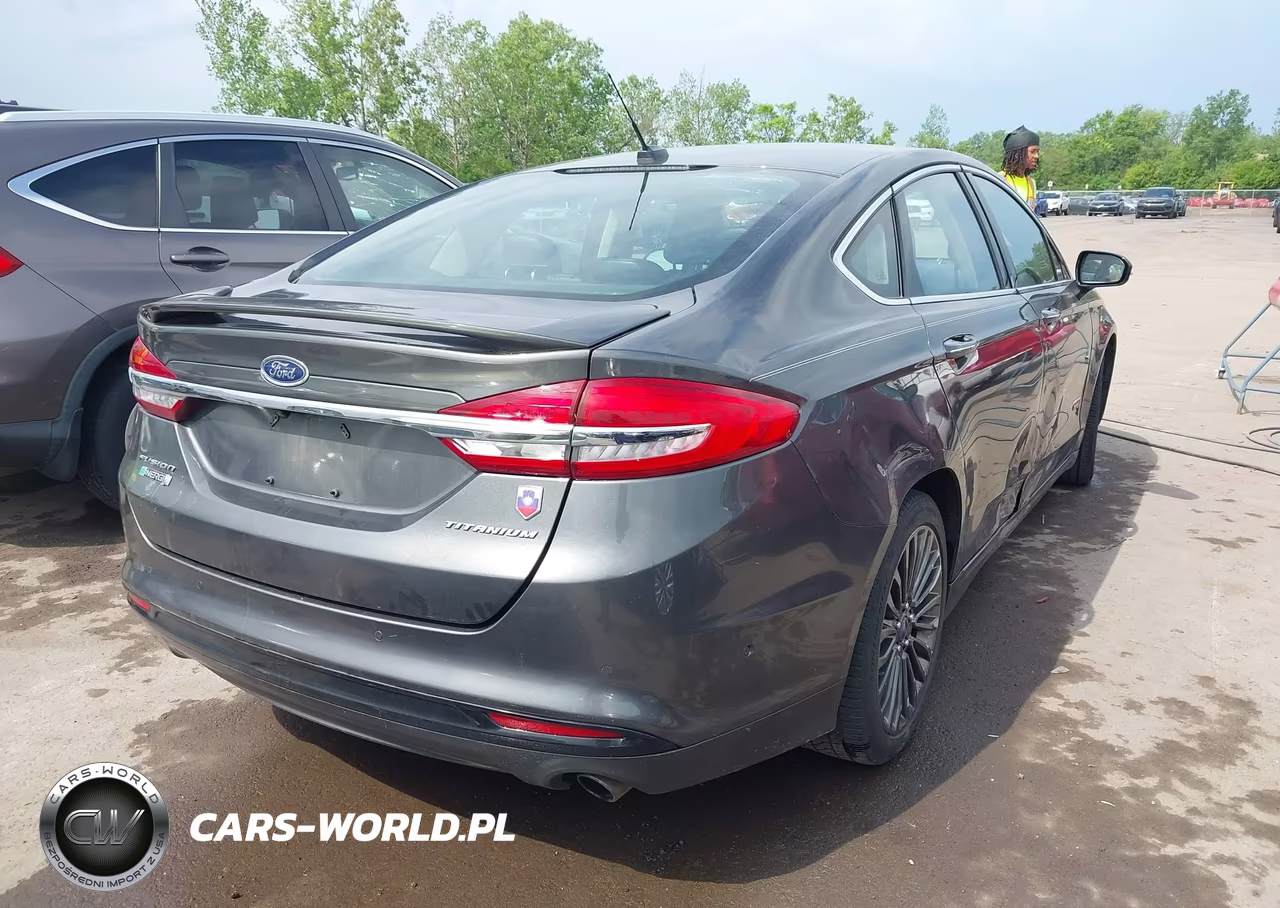 2017 Ford Fusion Energi Titanium VIN:3FA6P0SU4HR152063 - 4