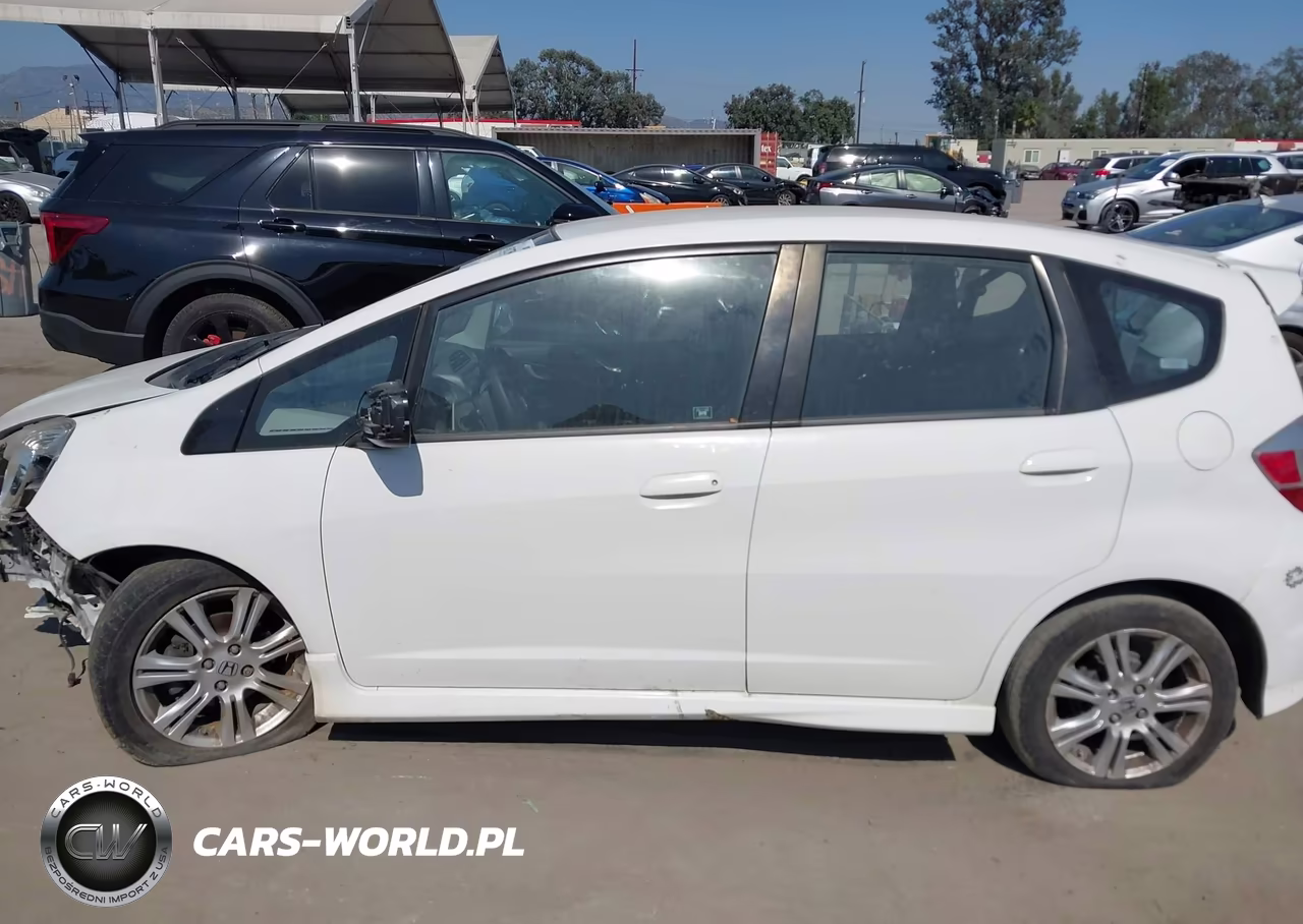 2009 Honda Fit Sport VIN:JHMGE884X9S045257 - 15
