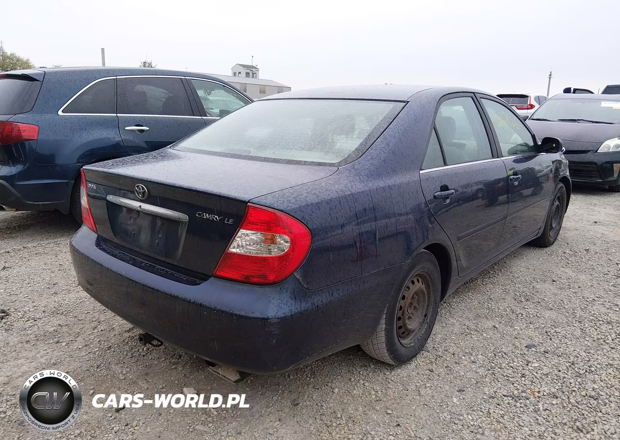 2003 Toyota Camry Le VIN:JTDBE32K330216410 - 4