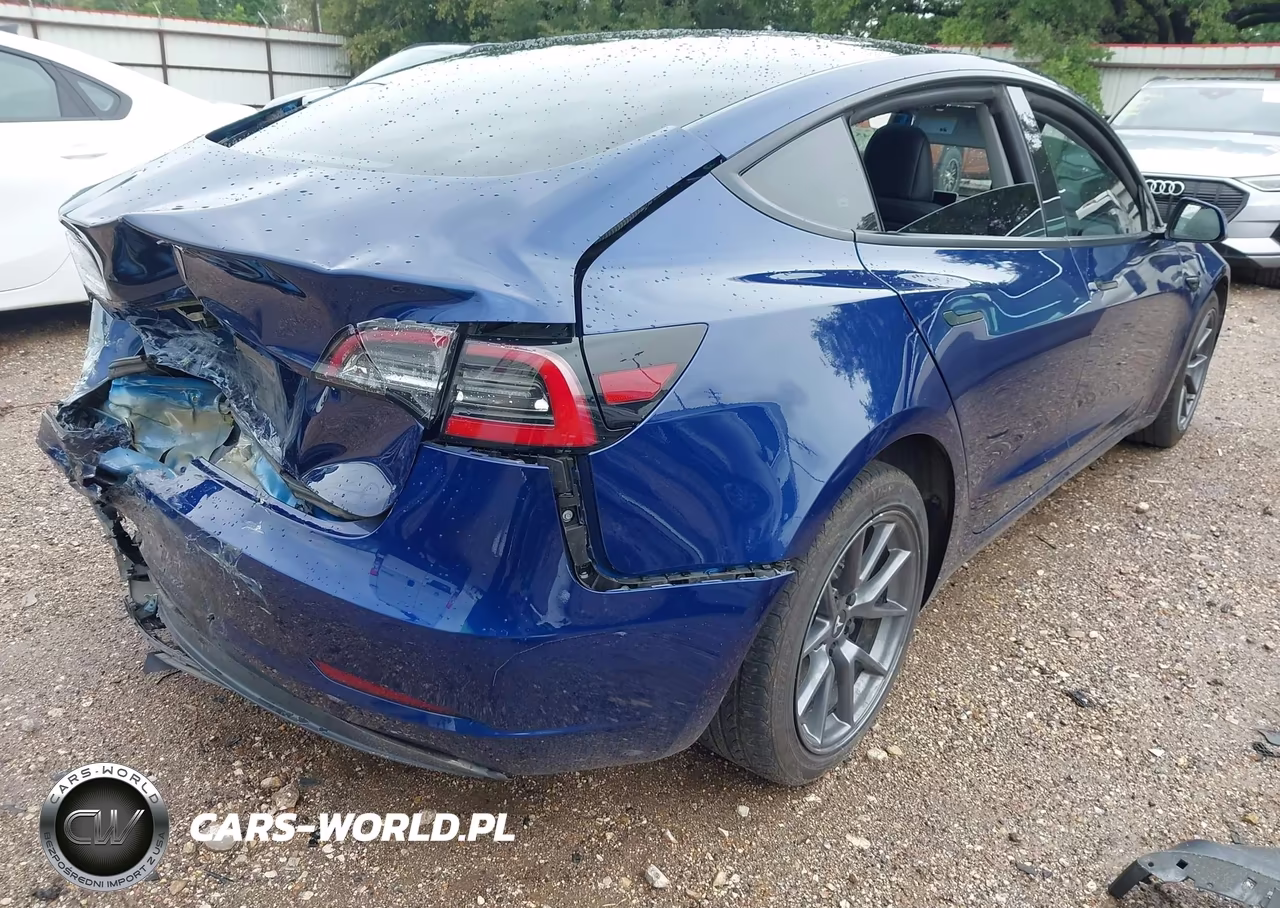 2023 Tesla Model 3 Rear-Wheel Drive VIN:5YJ3E1EAXPF434654 - 4