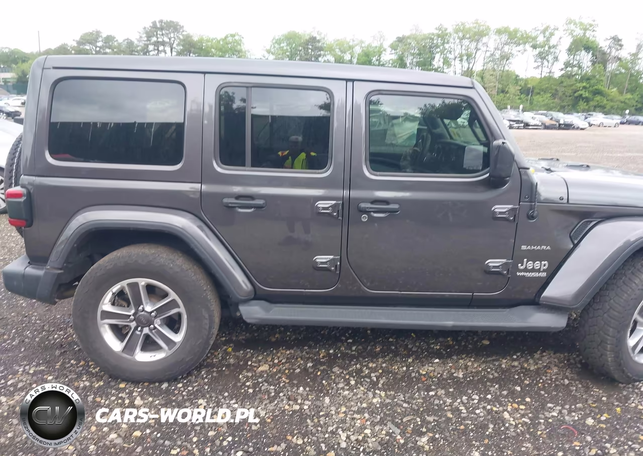 2019 Jeep Wrangler Unlimited Sahara 4X4 VIN:1C4HJXEN5KW691393 - 13
