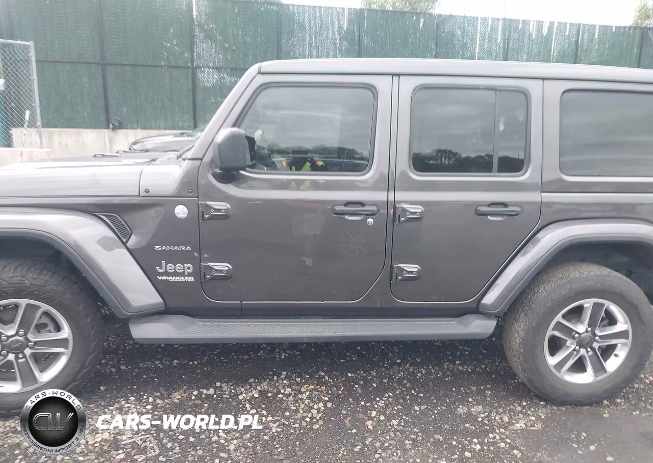 2019 Jeep Wrangler Unlimited Sahara 4X4 VIN:1C4HJXEN5KW691393 - 14