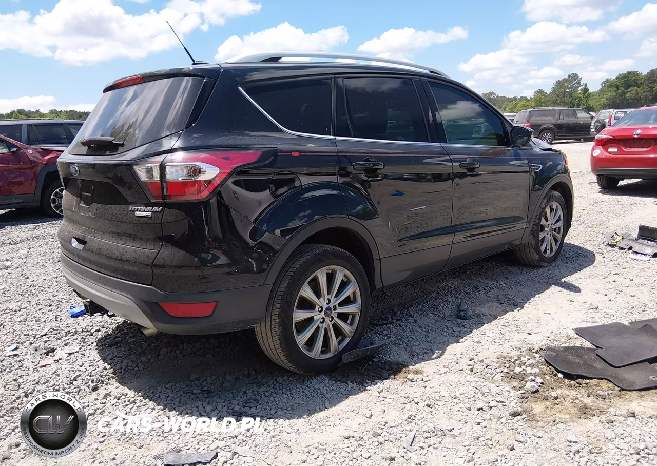 2017 Ford Escape Titanium VIN:1FMCU9J94HUC13455 - 4