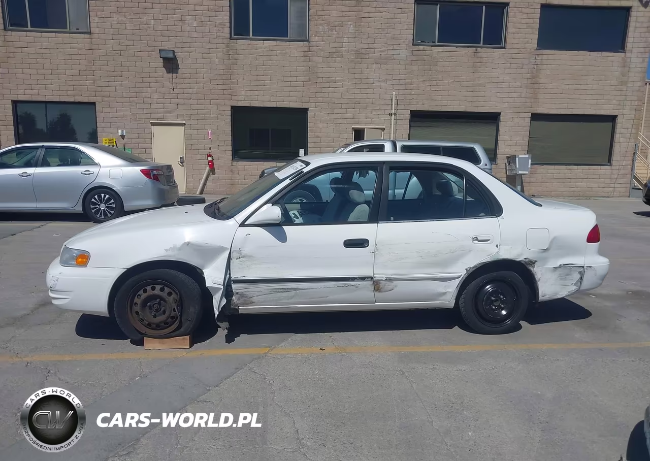 2000 Toyota Corolla Le VIN:1NXBR12E0YZ360253 - 14