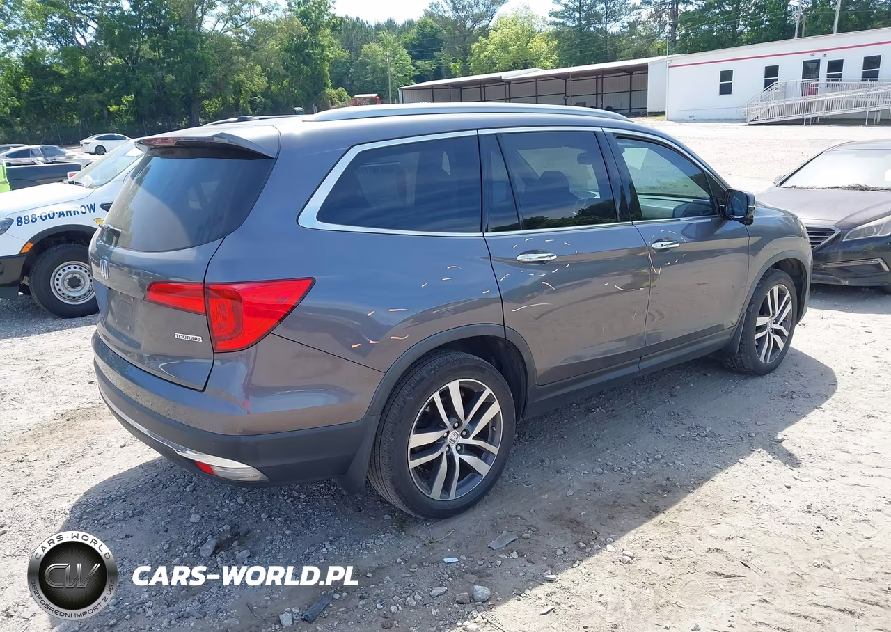 2017 Honda Pilot Touring VIN:5FNYF5H90HB013829 - 4