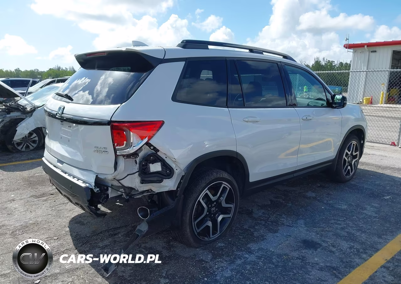 2023 Honda Passport Awd Elite VIN:5FNYF8H08PB023140 - 4