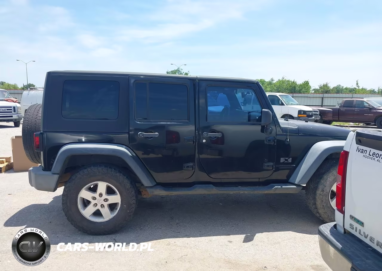 2009 Jeep Wrangler Unlimited X VIN:1J4GA39149L762312 - 13