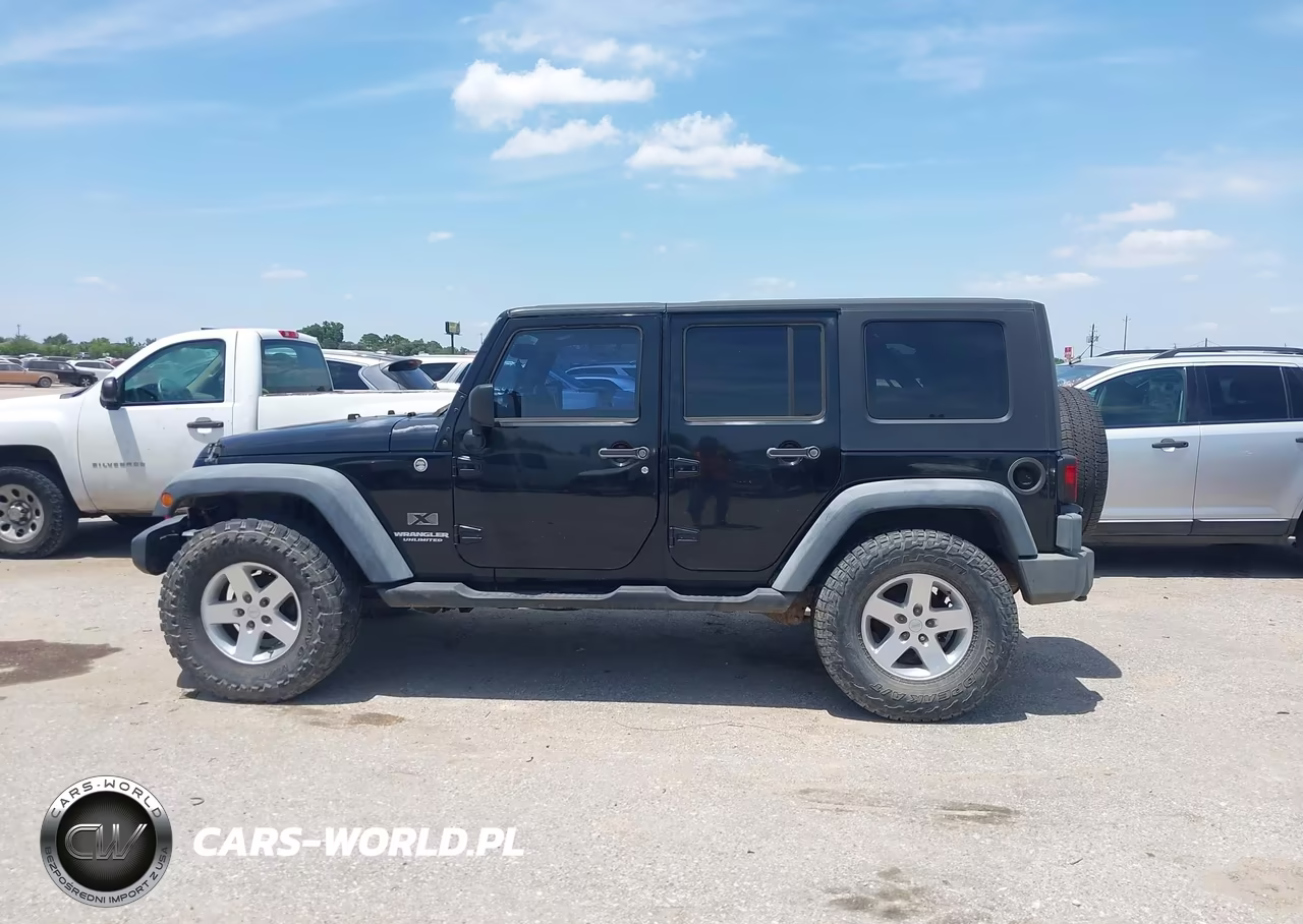 2009 Jeep Wrangler Unlimited X VIN:1J4GA39149L762312 - 14