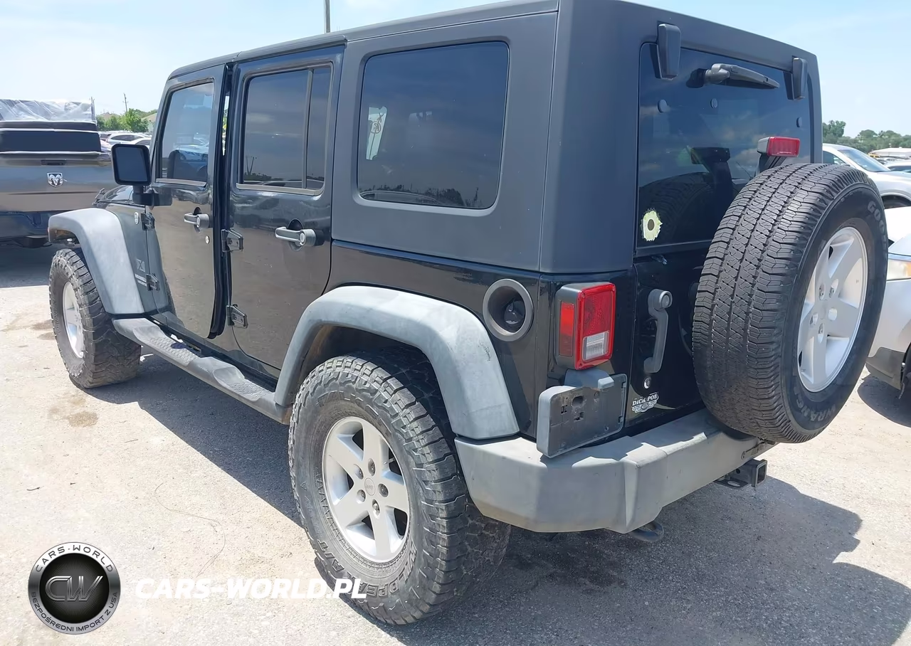 2009 Jeep Wrangler Unlimited X VIN:1J4GA39149L762312 - 3