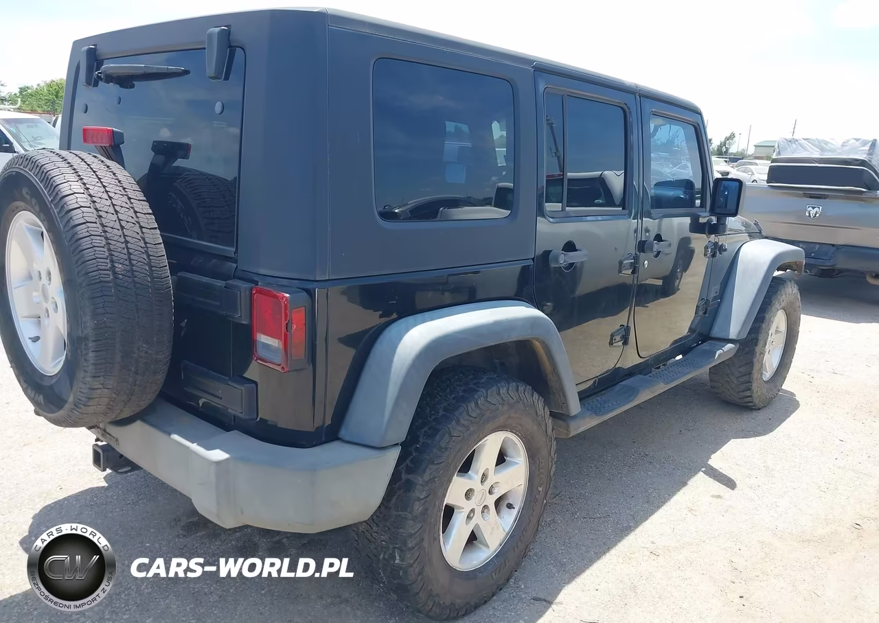 2009 Jeep Wrangler Unlimited X VIN:1J4GA39149L762312 - 4