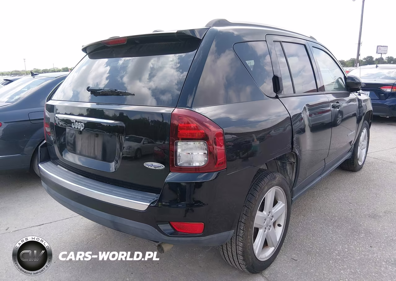 2014 Jeep Compass High Altitude VIN:1C4NJCEA7ED678573 - 4