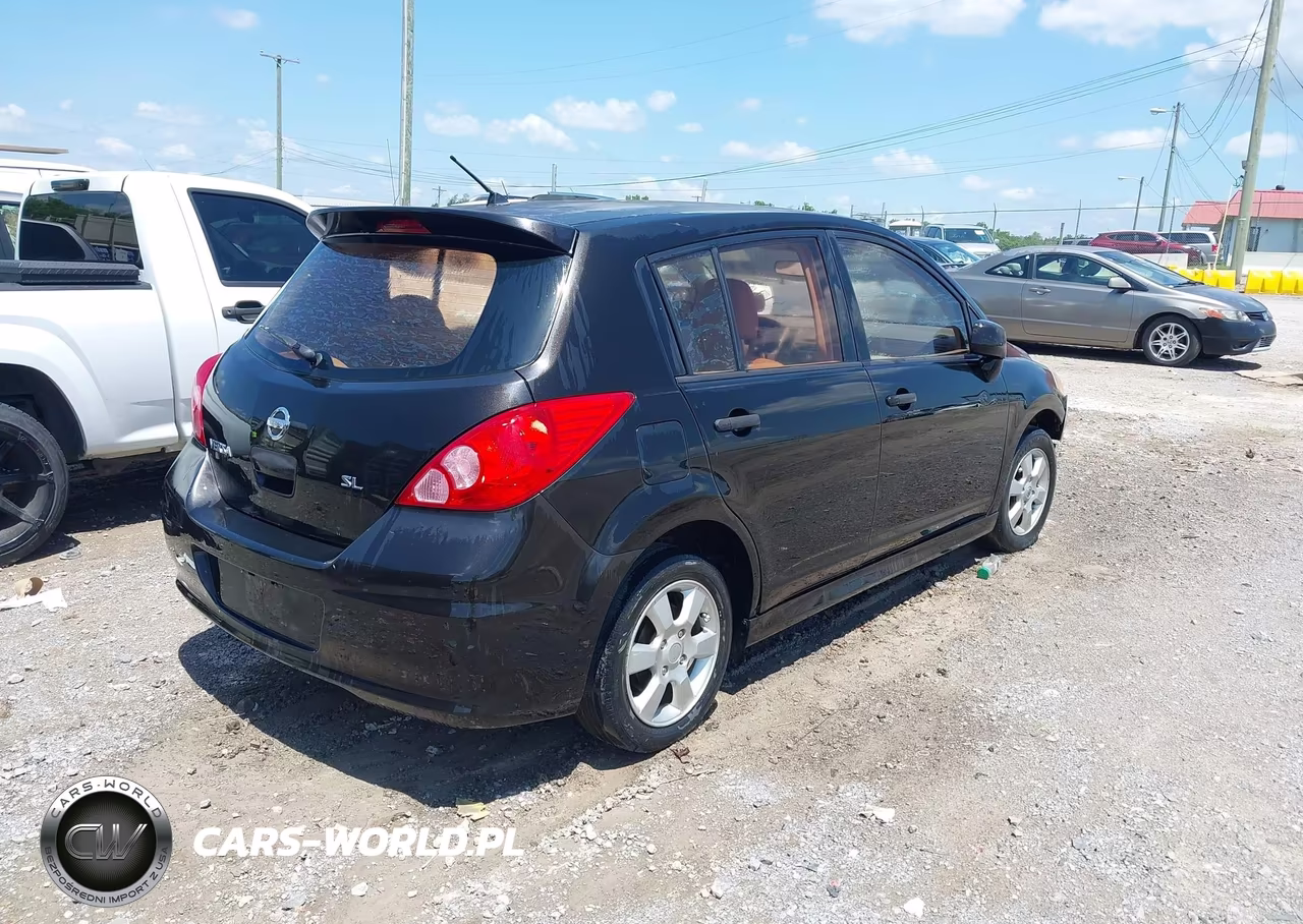 2010 Nissan Versa 1.8Sl VIN:3N1BC1CP0AL439706 - 4