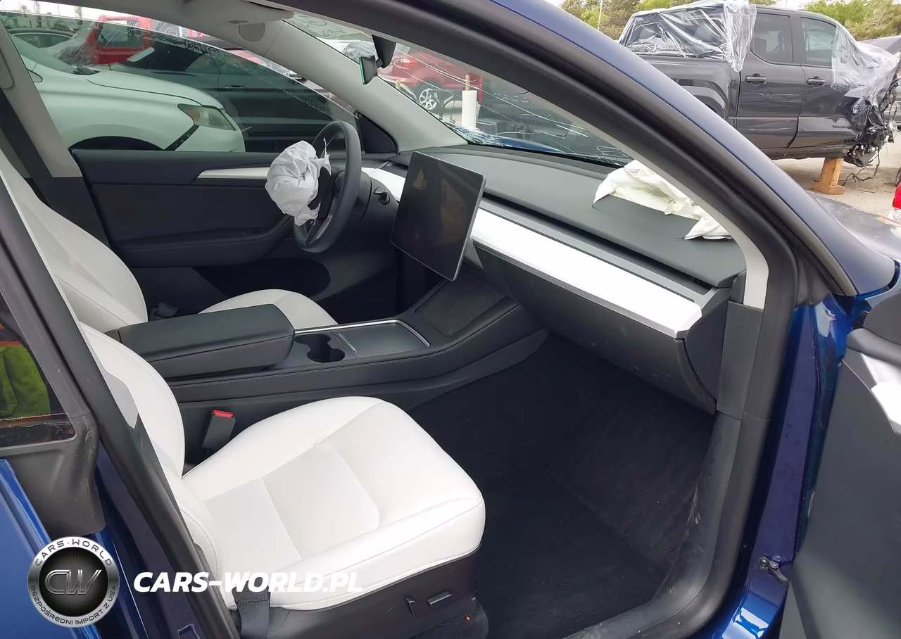 2023 Tesla Model Y Performance Dual Motor All-Wheel Drive VIN:7SAYGDEF5PF621302 - 5