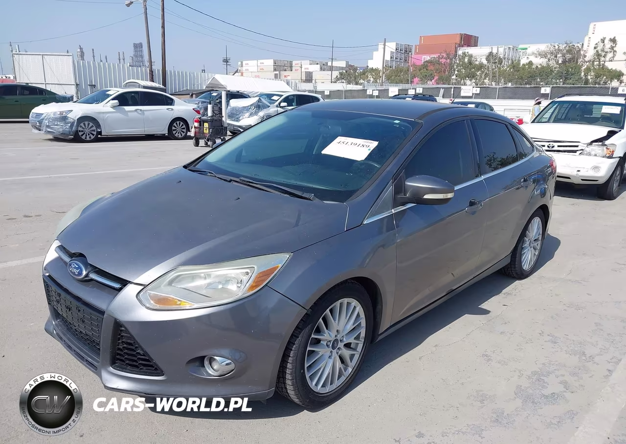 2014 Ford Focus Titanium VIN:1FADP3J27EL422129 - 2