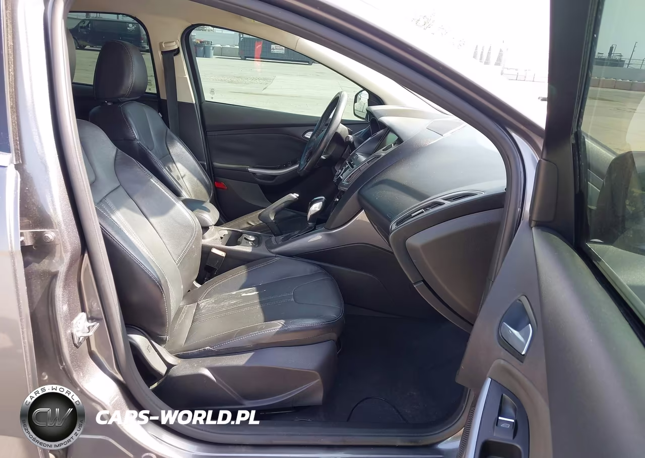 2014 Ford Focus Titanium VIN:1FADP3J27EL422129 - 5