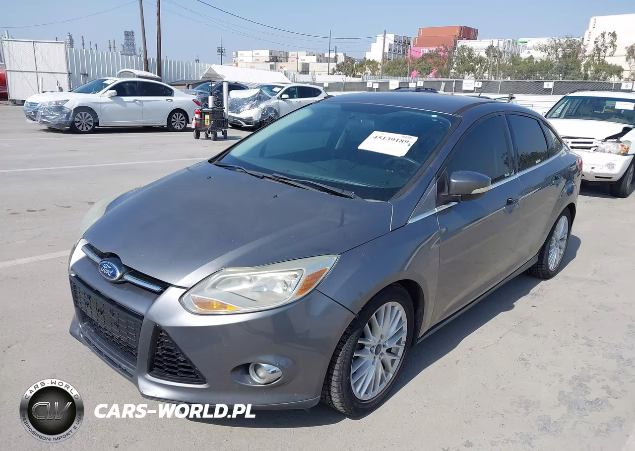 2014 Ford Focus Titanium VIN:1FADP3J27EL422129 - 6