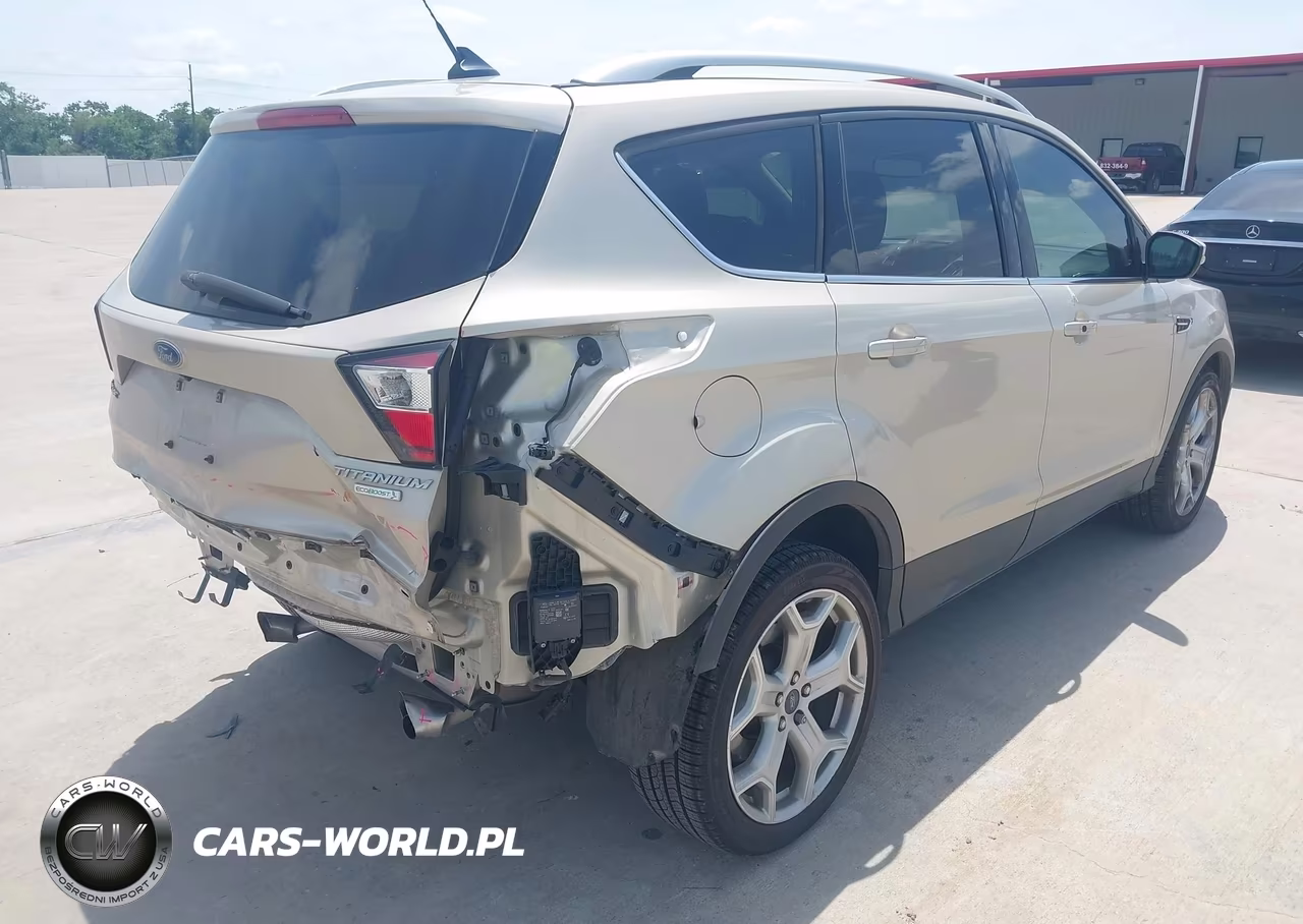 2018 Ford Escape Titanium VIN:1FMCU0J99JUB71740 - 4