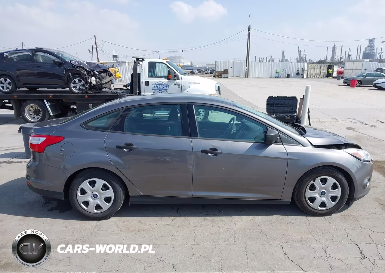 2014 Ford Focus S VIN:1FADP3E21EL341489 - 13