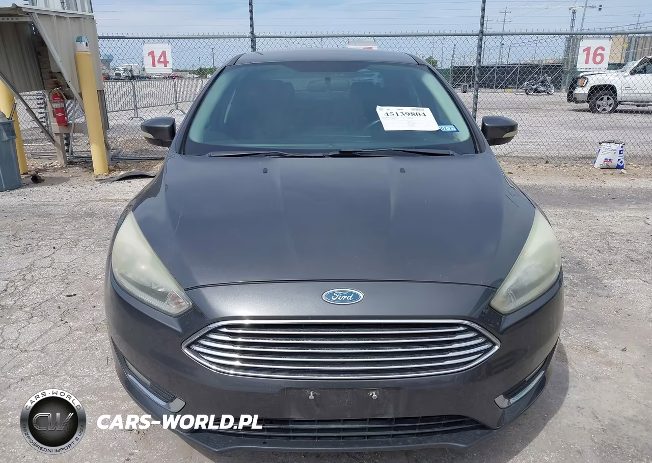 2015 Ford Focus Titanium VIN:1FADP3J21FL255199 - 12