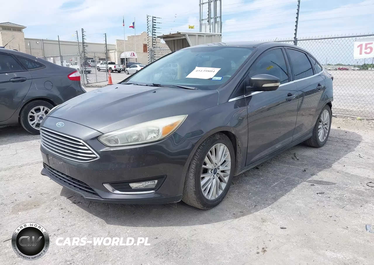 2015 Ford Focus Titanium VIN:1FADP3J21FL255199 - 2