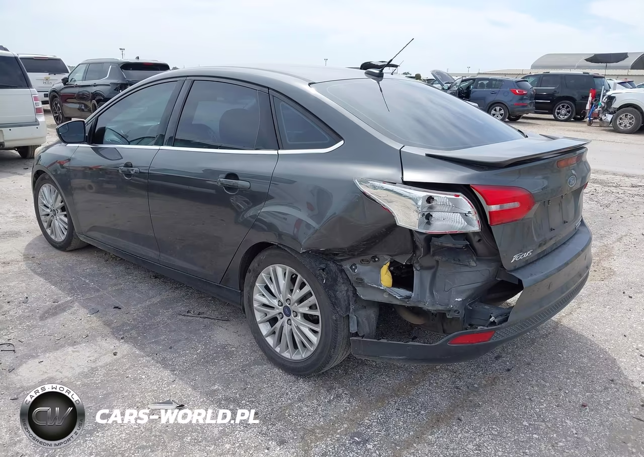 2015 Ford Focus Titanium VIN:1FADP3J21FL255199 - 3