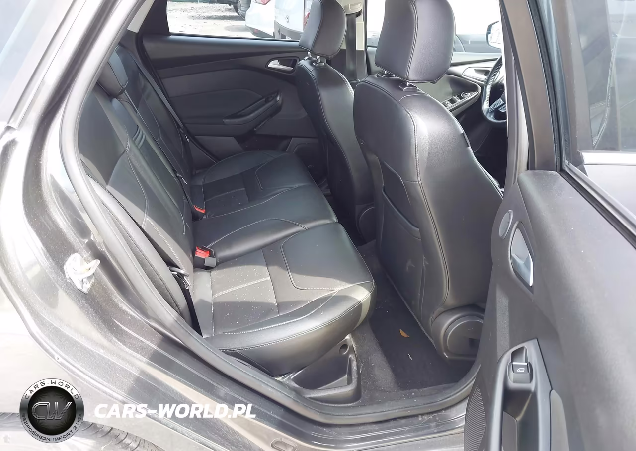 2015 Ford Focus Titanium VIN:1FADP3J21FL255199 - 8