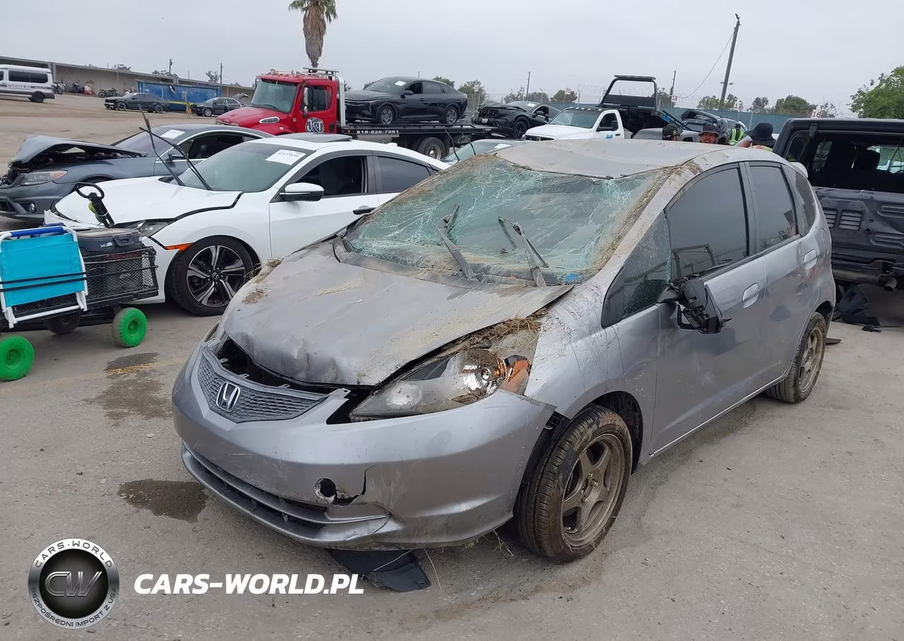 2009 Honda Fit VIN:JHMGE88209S055049 - 6