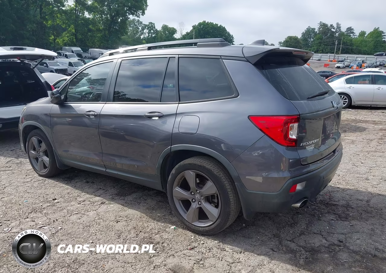 2019 Honda Passport Touring VIN:5FNYF7H95KB010573 - 14