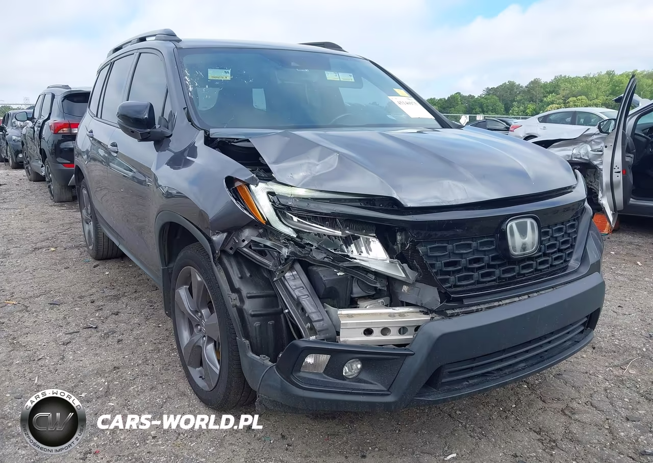 2019 Honda Passport Touring VIN:5FNYF7H95KB010573 - 6