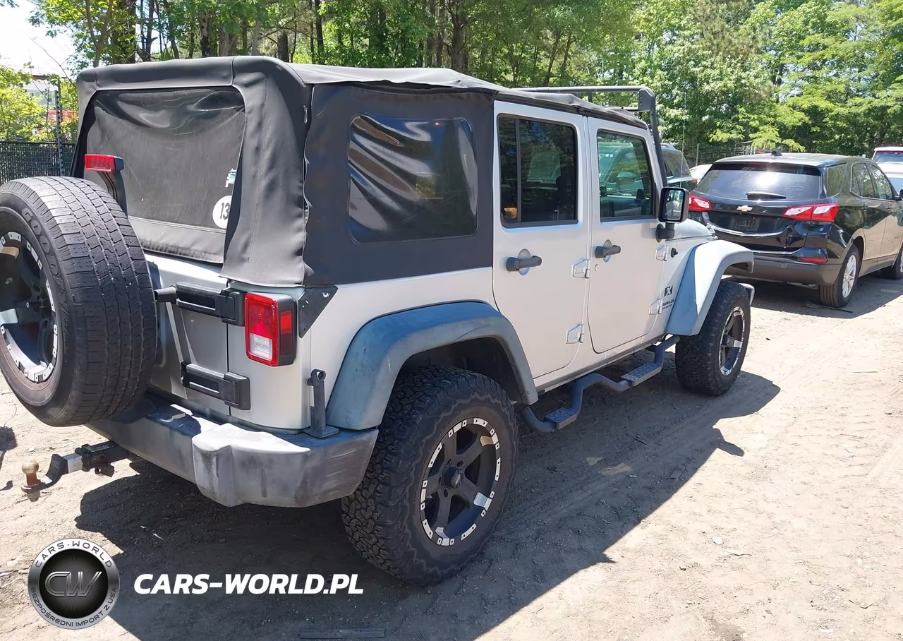 2009 Jeep Wrangler Unlimited X VIN:1J4GA391X9L733266 - 4