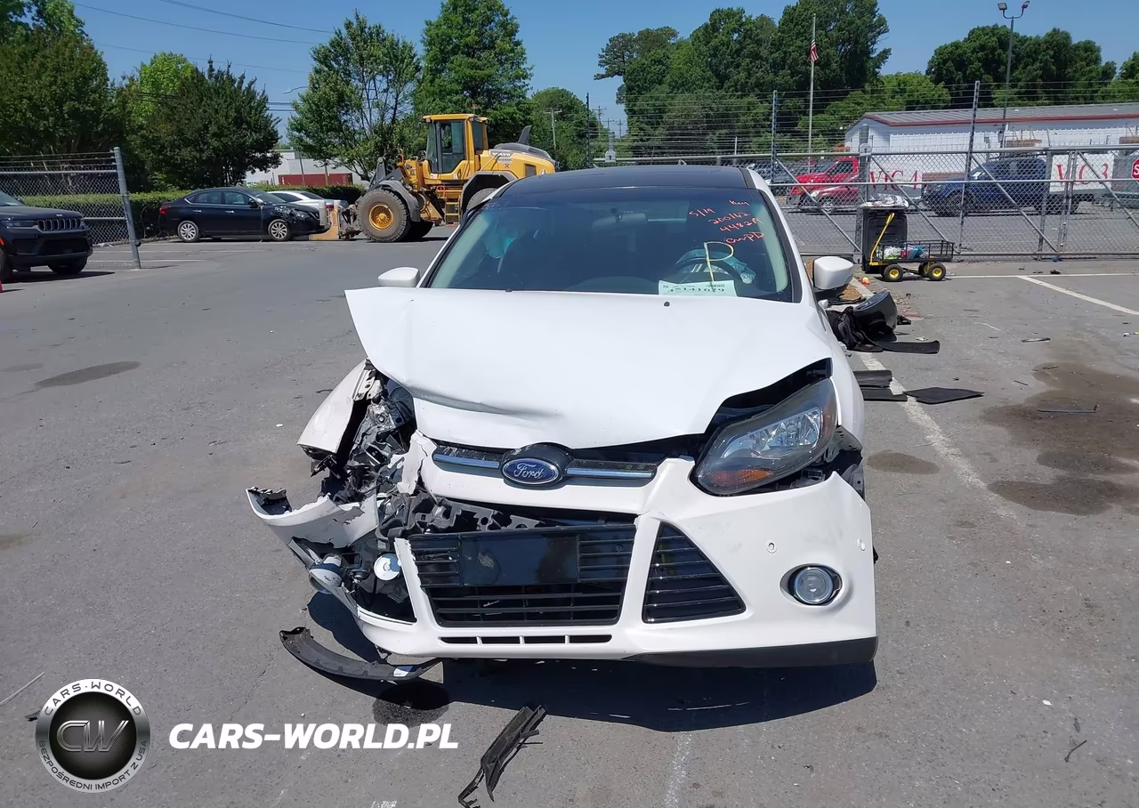 2013 Ford Focus Titanium VIN:1FADP3J24DL200162 - 12