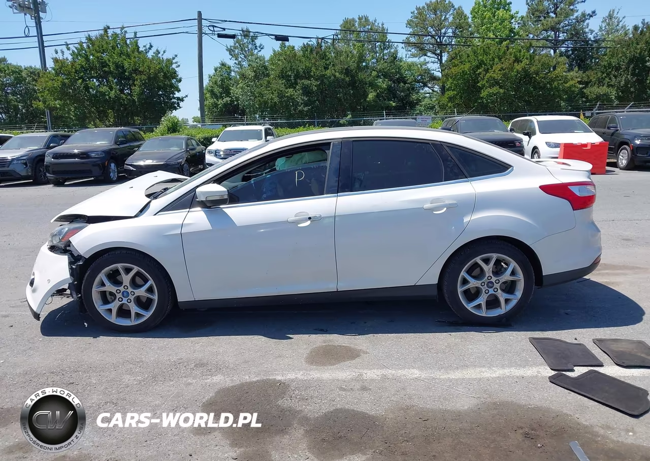 2013 Ford Focus Titanium VIN:1FADP3J24DL200162 - 14