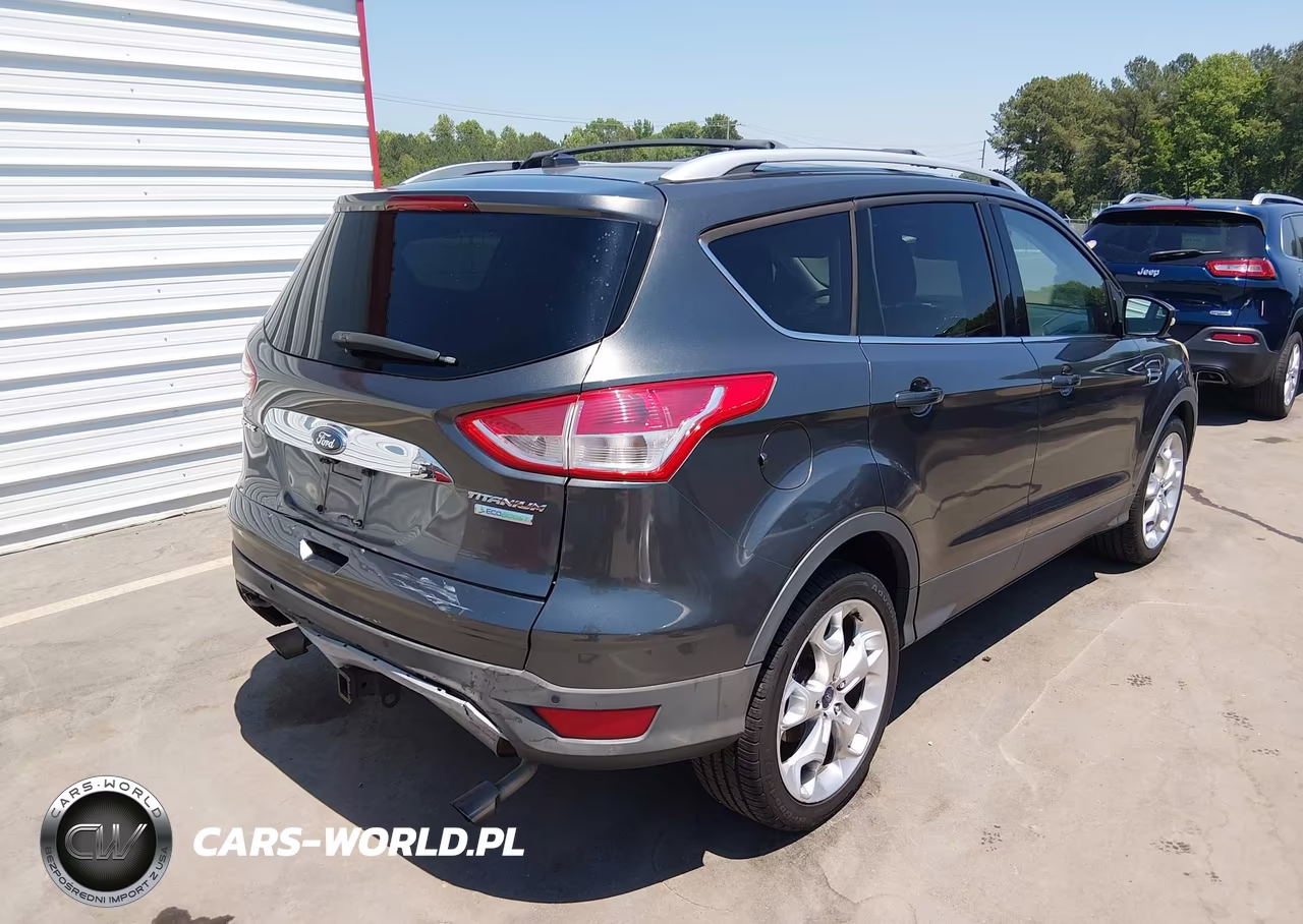 2015 Ford Escape Titanium VIN:1FMCU0J9XFUC01013 - 4
